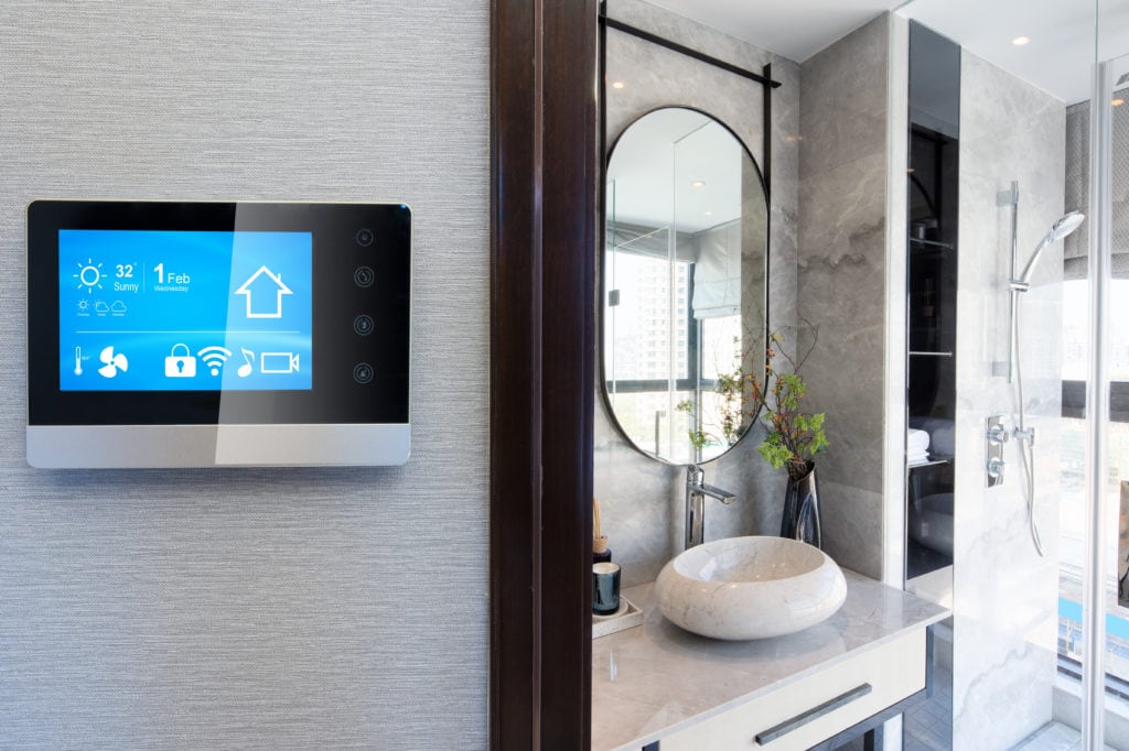 smart home system on intelligence screen on wall and background of modern bathroom.