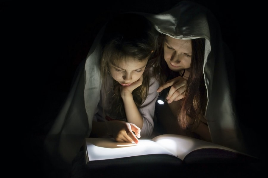 Reading in the dark.