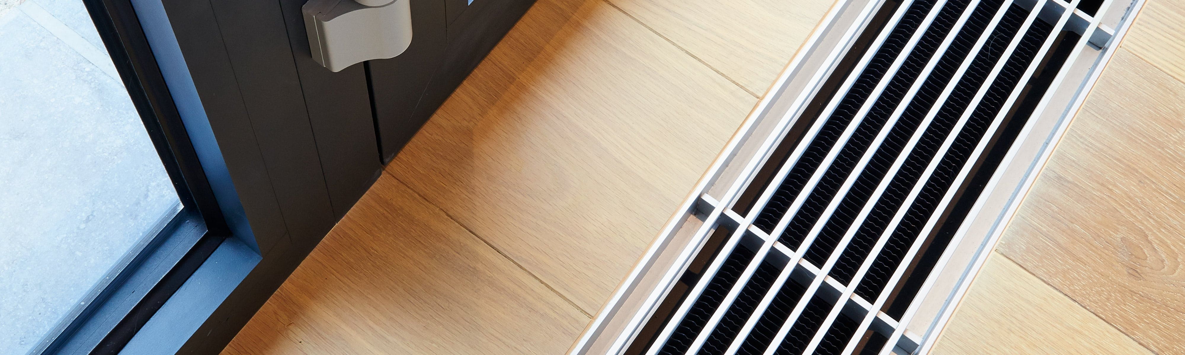 Air vent on a wooden floor.