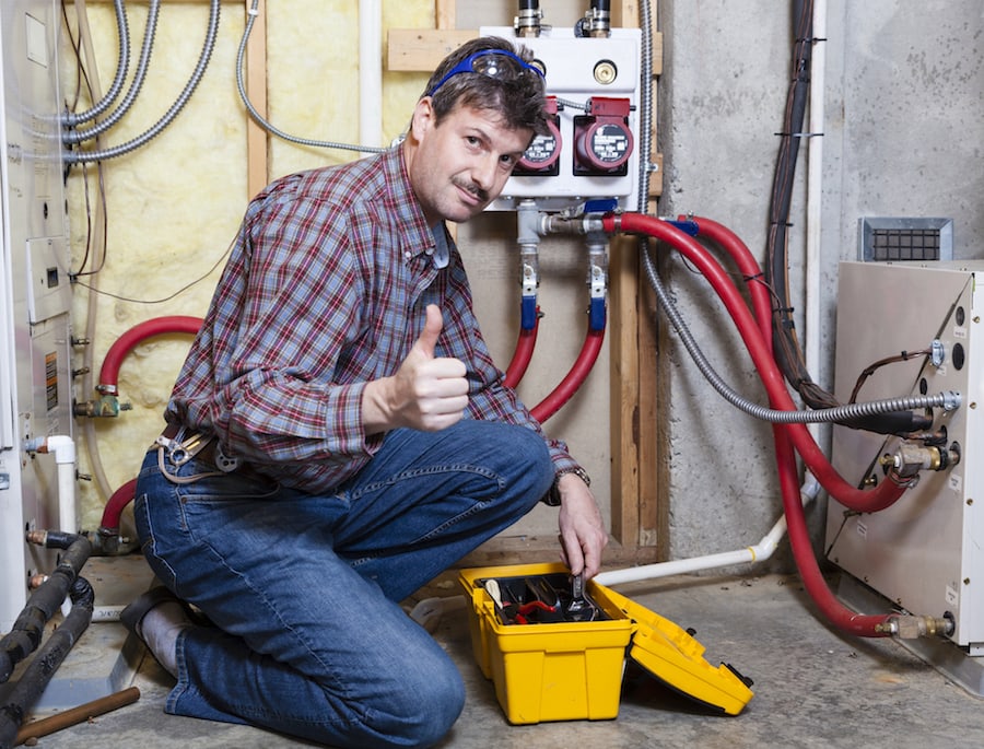 Happy handyman showing thumbs up, NATE Certification