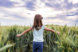 5 Electrical Tips to Save Money. Photo of a young female child in a field during the daylight.