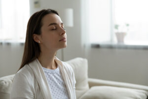 Why Do I Need a Humidifier? A lady breathing in fresh air.