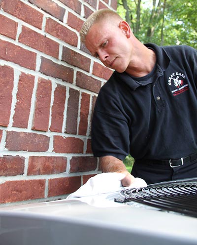 Technician working on AC Unit