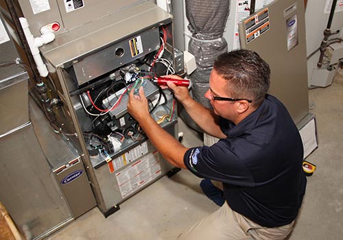 Technician working on Furnace